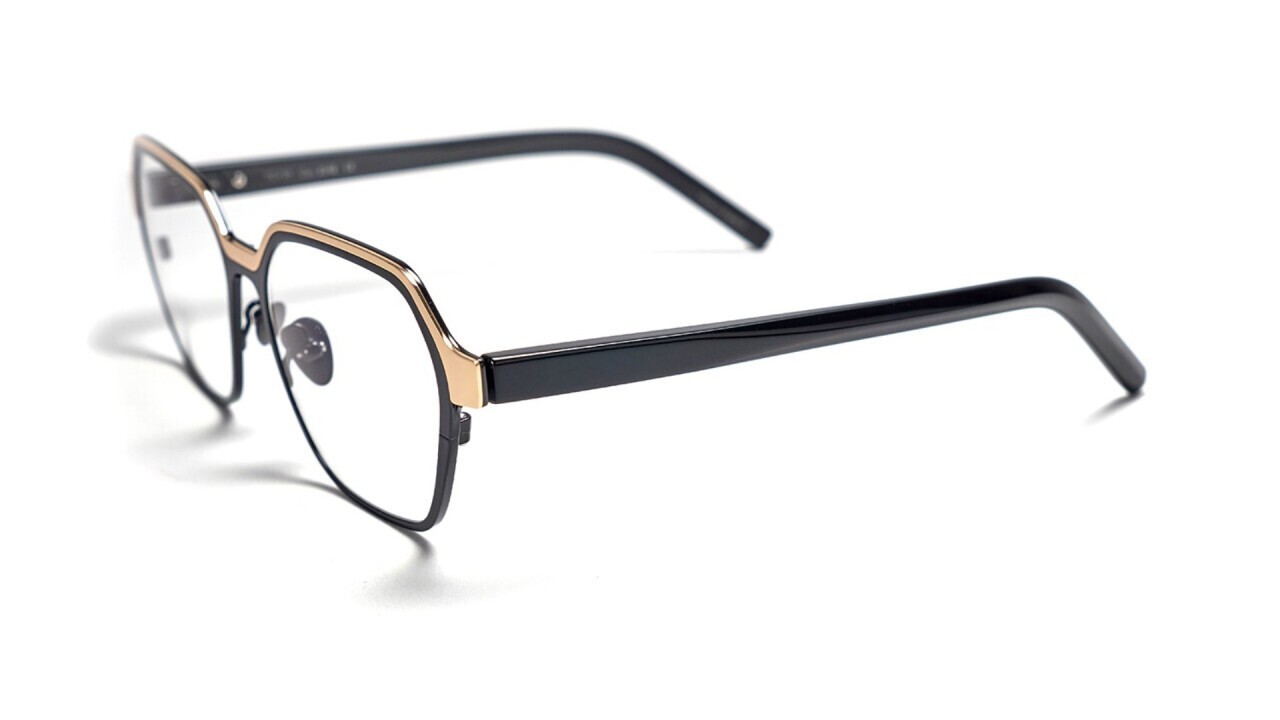 exclusive Tom Davies frame made of two layers of titanium, combined with acetate temples