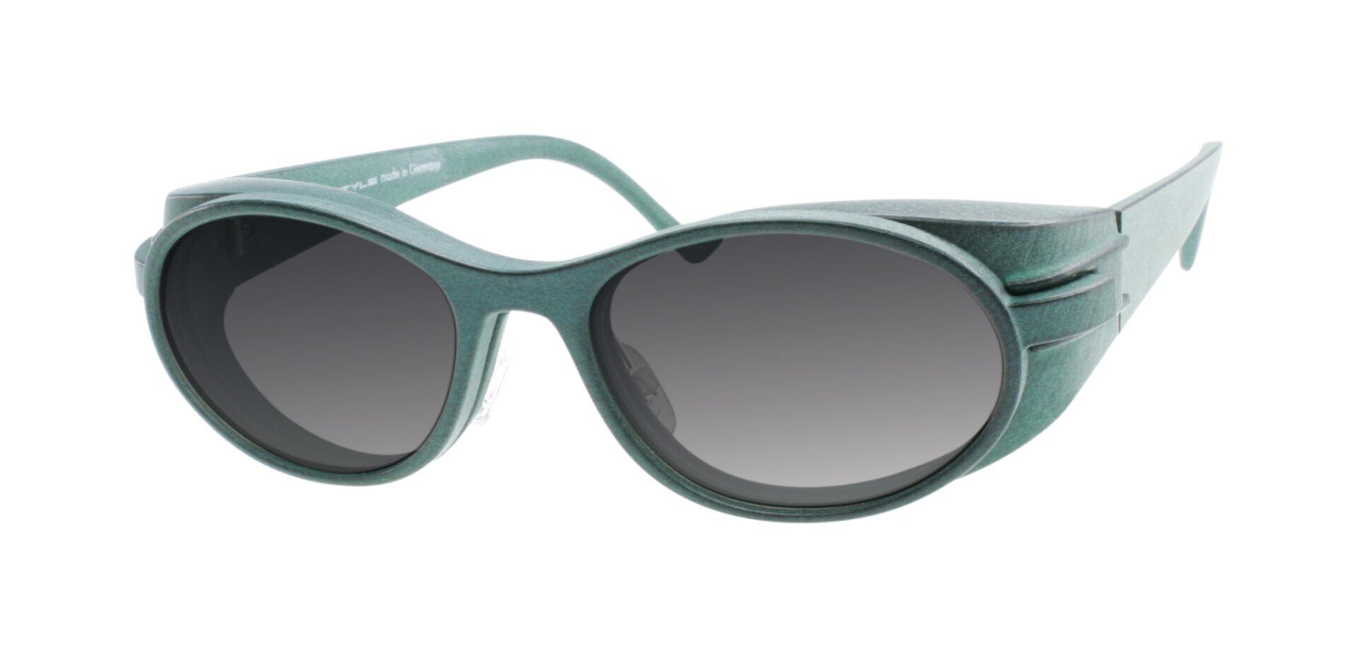 Seitenschutzsfassung mit ovalen Gläsern und Magnet Sunclip in der Farbe petrol. Die Bügel sind breit mit einem geschichteten Design-Detail in der Nähe der Scharniere.