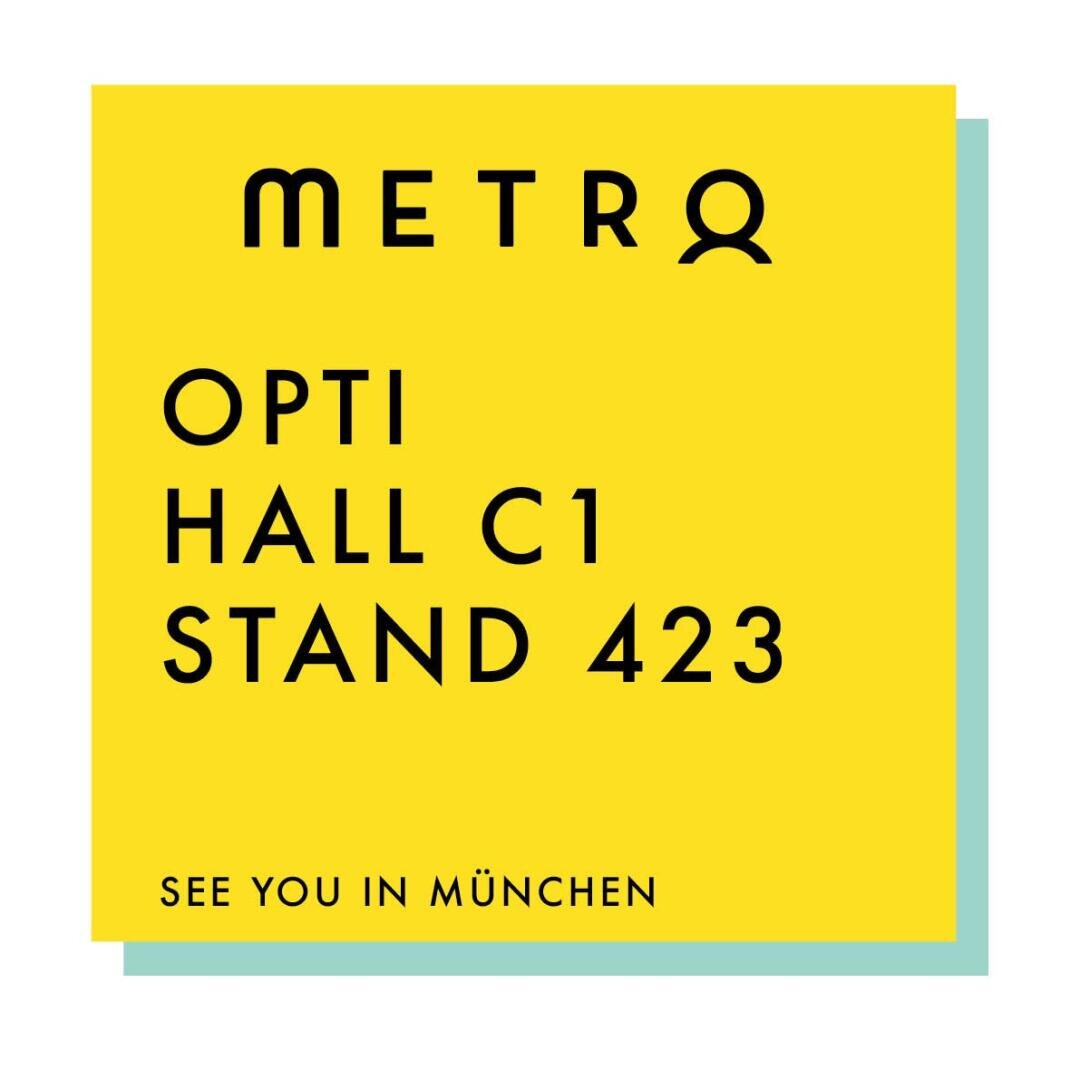 A yellow square with black text: METRO OPTI HALL C1 STAND 423 SEE YOU IN MÜNCHEN on a light blue background.