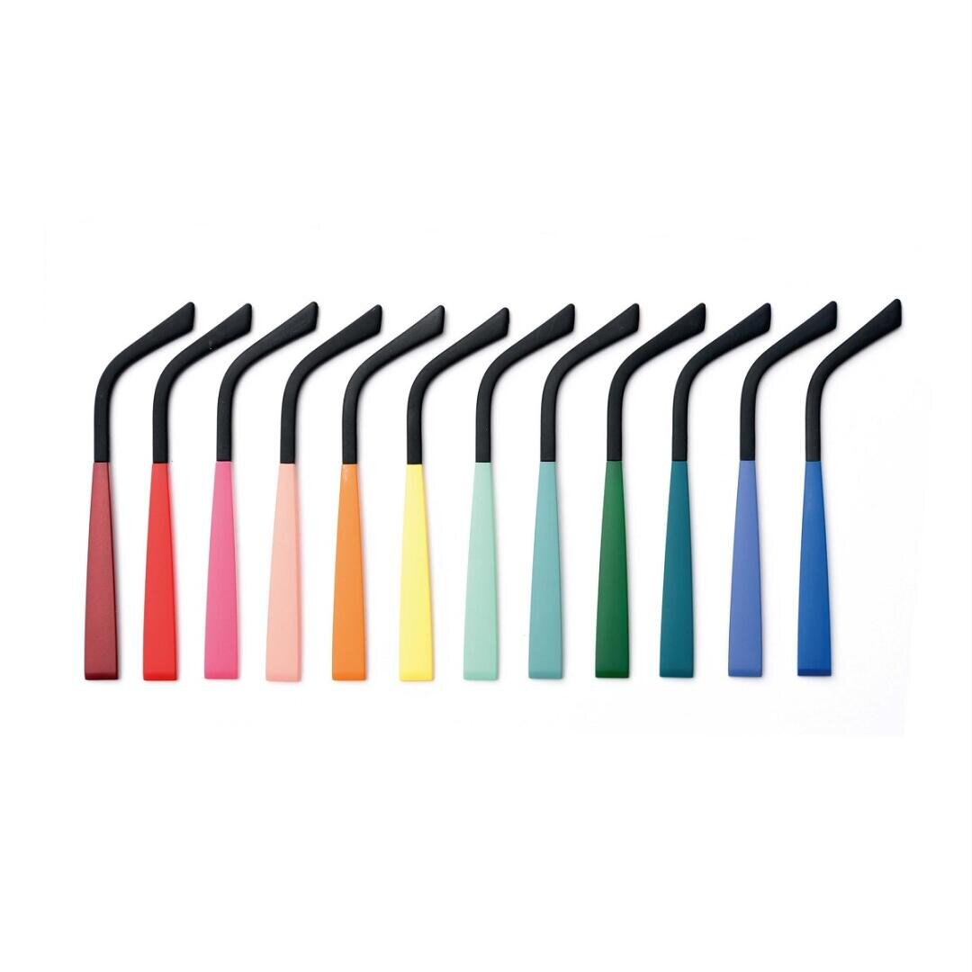 Twelve toothbrushes with black bristles and handles in different colors, arranged in a row on a white background. The handles are red, pink, orange, yellow, peach, mint, turquoise, green, dark green, blue, light blue and purple.