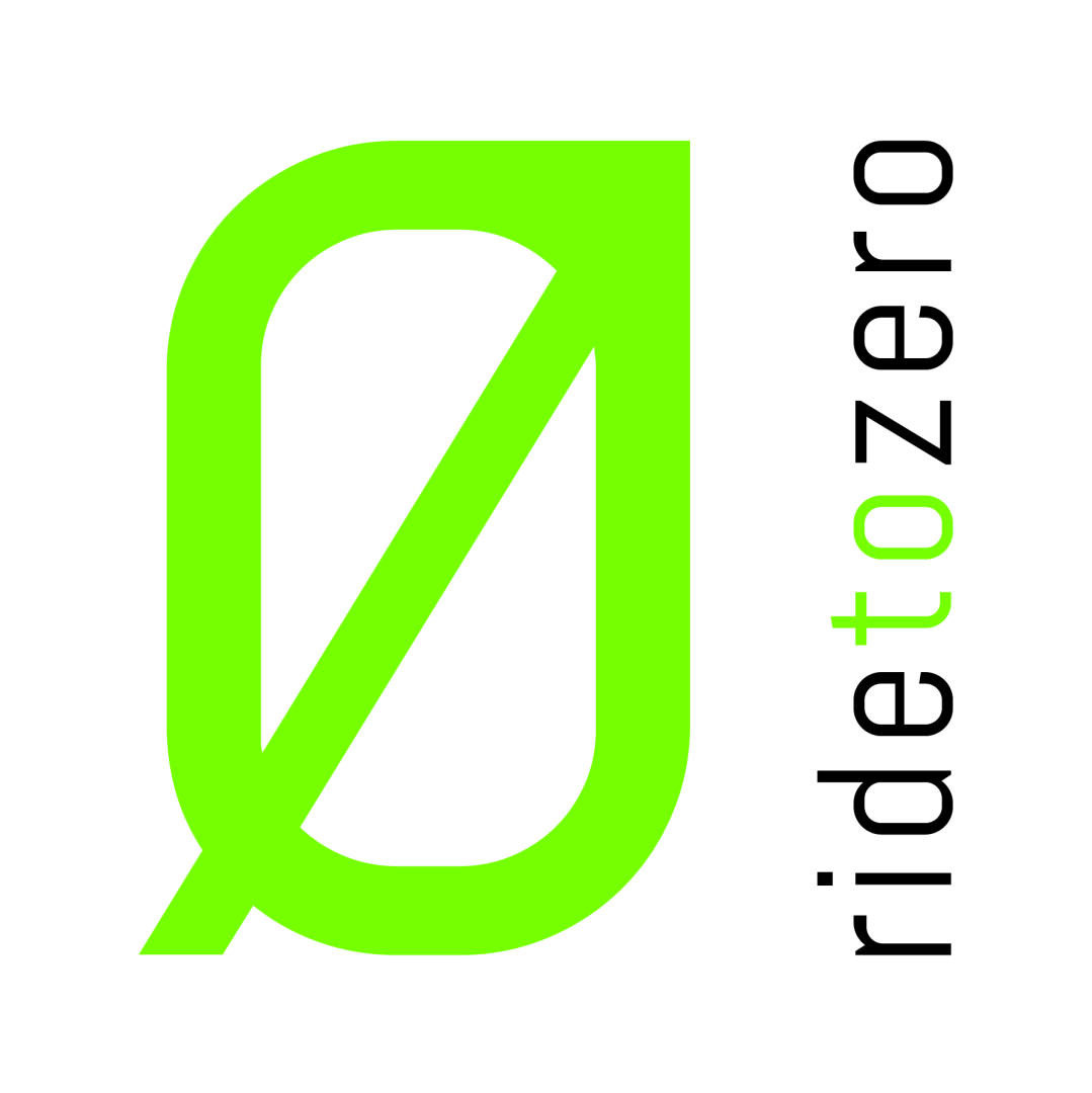 A green stylized zero with a diagonal line appears next to the words ride to zero, which are written vertically with to in green and the rest in black on a white background.