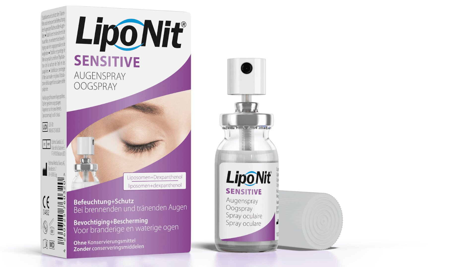 Eine Schachtel und eine Flasche LipoNit Sensitive Eye Spray sind ausgestellt. Die Verpackung ist weiß und lila, mit deutschem und niederländischem Text und dem Bild eines geschlossenen Auges. Die Flasche hat einen Sprühkopf und eine durchsichtige Kappe.