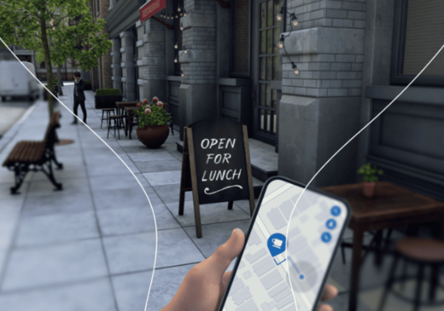 Eine Person hält ein Smartphone in der Hand, das eine Karte vor einem Restaurant mit der Aufschrift OPEN FOR LUNCH auf einem Bürgersteig mit Bänken, Bäumen und Lichterketten zeigt.