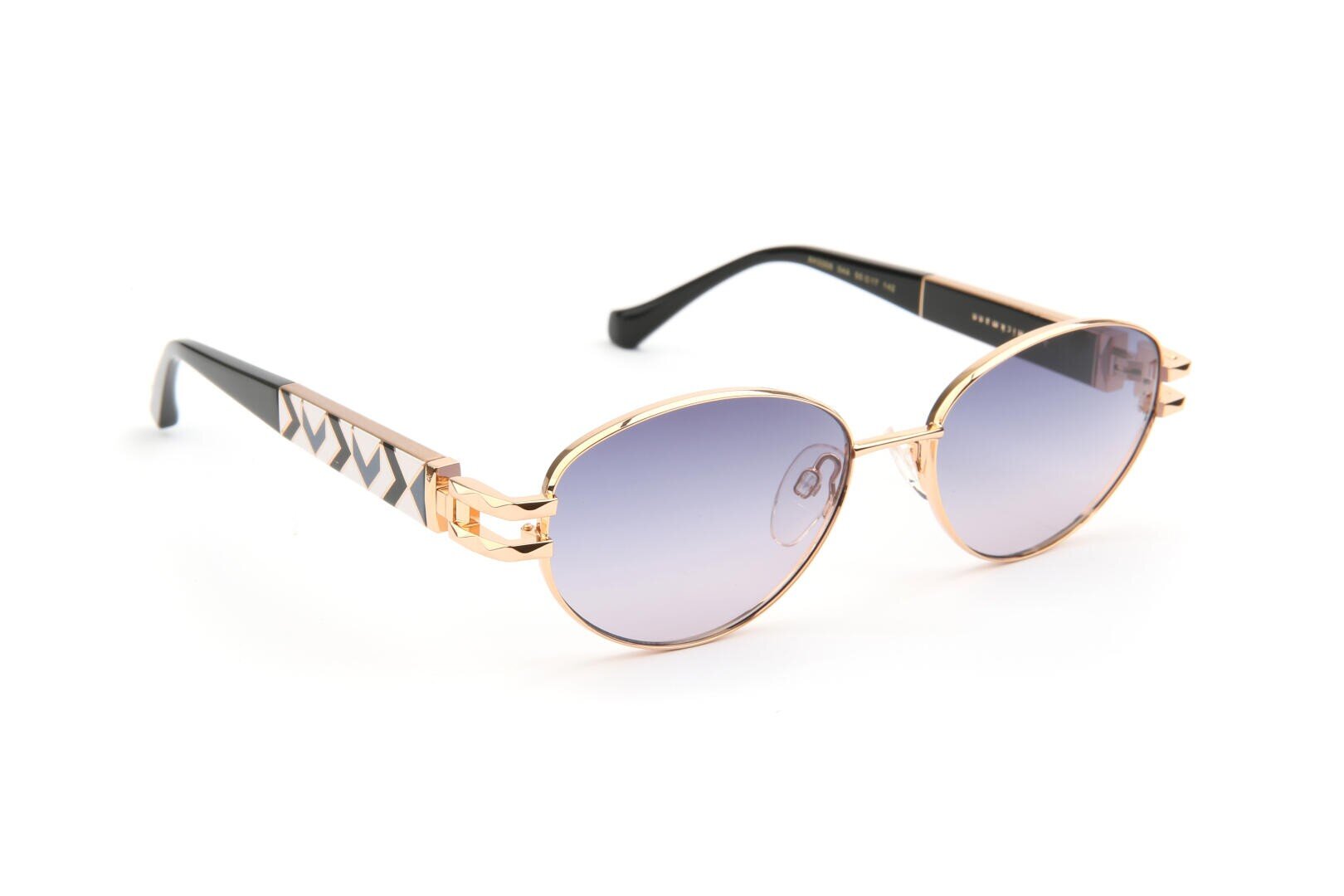 Round sunglasses with gold metal frames, purple gradient lenses, and black arms featuring a geometric pattern in gold and white, displayed on a white background.