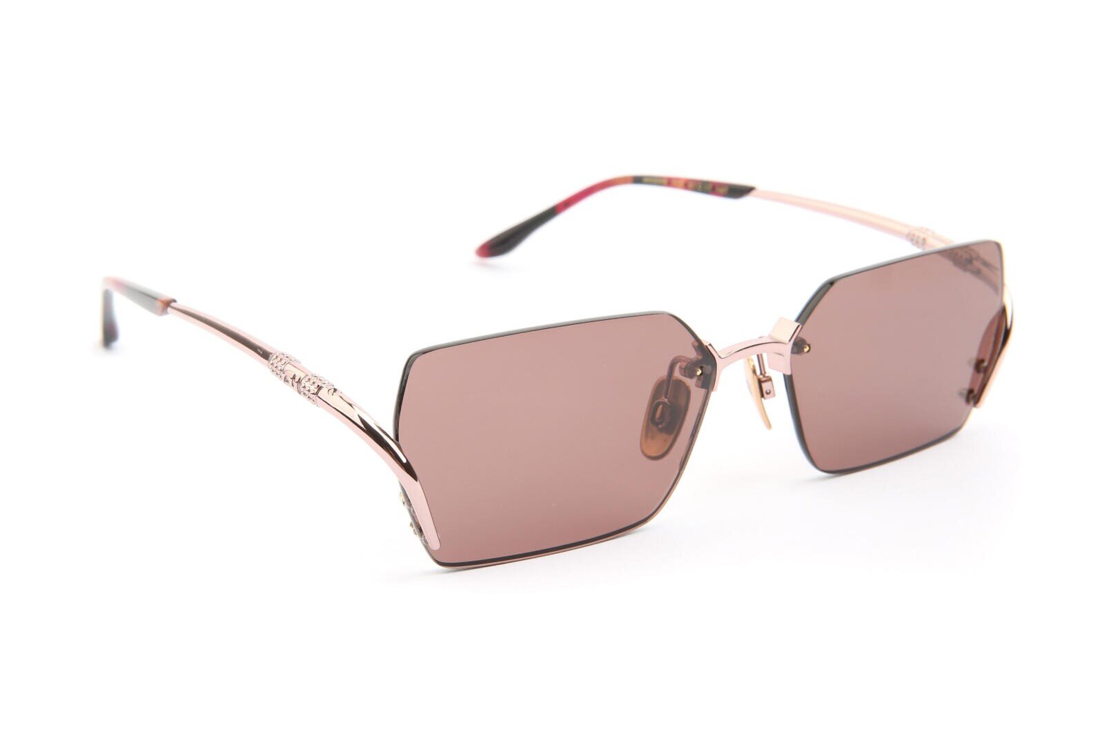 Square-shaped sunglasses with rose-tinted lenses and thin, metallic rose gold temples. The sunglasses are rimless, with decorative detailing on the temples, and are displayed on a white background.