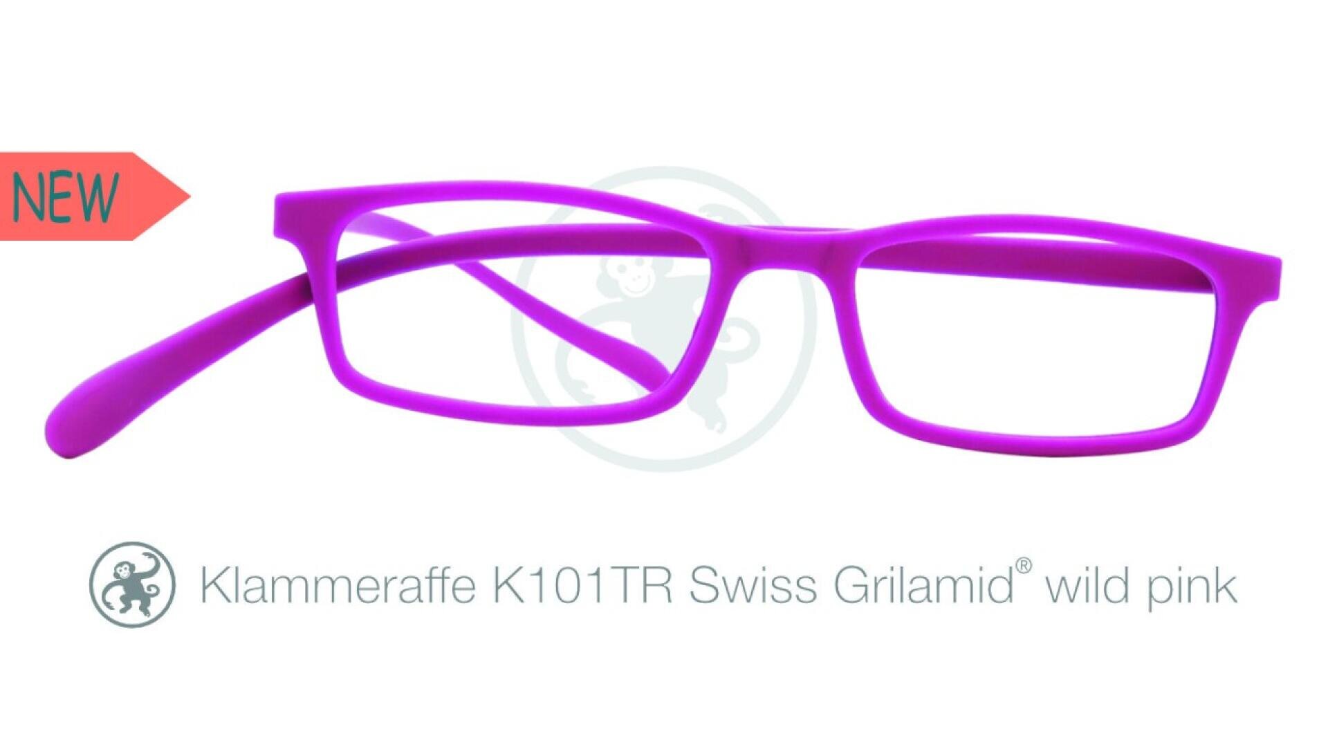 Bright pink rectangular eyeglass frames are displayed on a white background with a small orange NEW label on the left. Text below reads: “Klammeraffe K101TR Swiss Grilamid® wild pink.”.